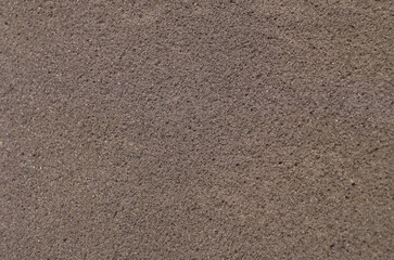 surface texture background of brown sponge foam material with rough pores