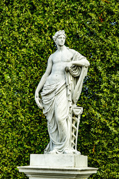 Vienna, Austria, September 26 2022. This is one of the park marble sculptures that adorns the alleys of Schonbrunn Palace Park