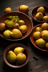 pears in ceramic bowls