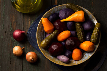 purple potatoes and other vegetables for vinaigrette, top view