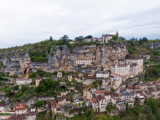 Naklejka premium Aerial view of Beautiful village Rocamadour in Lot department, southwest France. Its Sanctuary of the Blessed Virgin Mary, has for centuries attracted pilgrims.