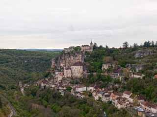 Fototapeta na wymiar Aerial view of Beautiful village Rocamadour in Lot department, southwest France. Its Sanctuary of the Blessed Virgin Mary, has for centuries attracted pilgrims.