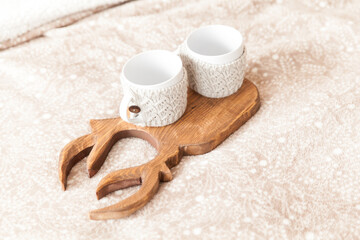 Wooden textured cutting board with deer antlers