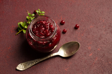 Delicious lingonberry sauce in a small jar