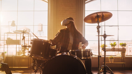 Portrait of a Young Female Wearing a Virtual Reality Headset, Playing Drums in a Loft Studio with...