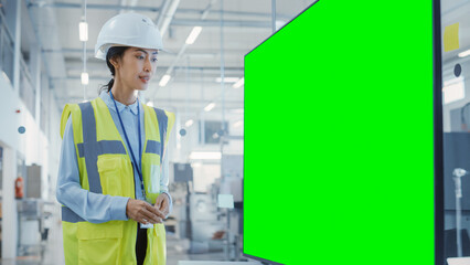 Factory Office Meeting: Senior Engineer Talking in a Conference Room with TV with Green Screen Mock...