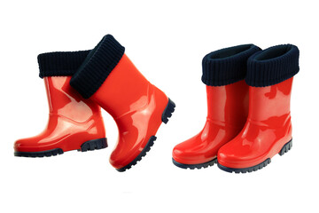 Childrens shoes and boots. Closeup of seasonable red rubber boots or gumboots isolated on a white background. Clipping path. Kids shoe fashion.