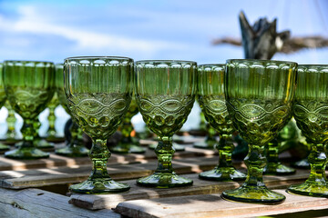 water glasses on the beach