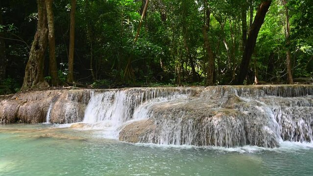 Landscape view of Erawan waterfall kanchanaburi thailand.Erawan National Park is home to one of the most popular falls in the thailand.
