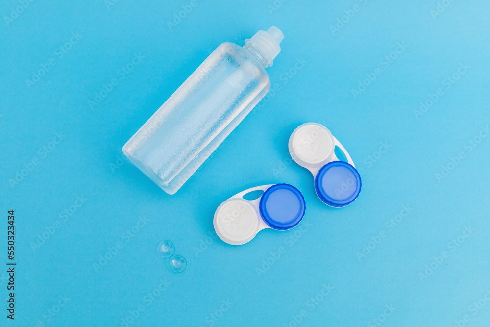 Sticker Subject photography of contact lenses on a blue background, with lens fluid