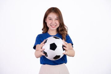 Asian woman smiling in blue t-shirt holding football to cheering the soccer game isolated on white screen background.