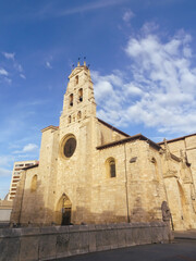 Fototapeta na wymiar Church (Iglesia) of San Lesmes Abad - patron saint of the city. A Gothic temple in the Spanish city of Burgos, Castilla y León, Spain. Vertical