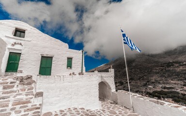 Beautiful white building on Mykonos island, Greece on a sunny day