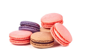 Heap of colorful macarons on white background
