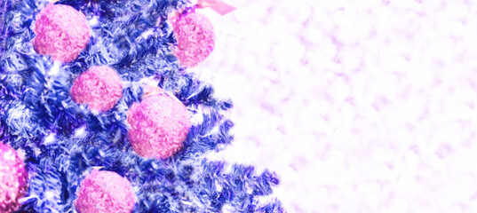 Christmas and New years eve Christmas Background. Beautiful Wide Angle Holiday Template, pink balls on fir tree highlights.