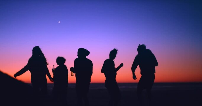 Silhouette, friends and dance at a beach, celebration and freedom against a night sky background, energy and bonding. Party, nature and happy people dancing outdoors, celebrating birthday at night