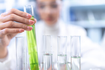 medicine chemical research with organic nature herbal plant in science laboratory, cosmetic extract liquid chemistry oil in glassware, leaf biology of beauty medicals care serum product experiment