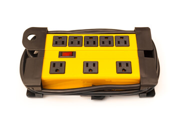 Yellow power strip with multiple plugs on white
