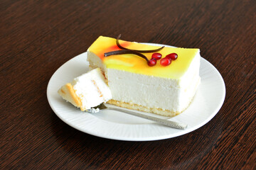 healthy lemon cake with yoghurt cream layer and jelly, close-up