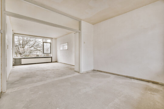 Empty room with window and radiator