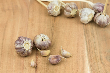 garlic on a wooden surface