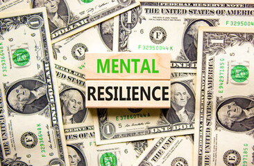 Mental resilience symbol. Concept word Mental resilience typed on wooden blocks. Beautiful...