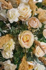 Beautiful background of roses and dried flowers close-up