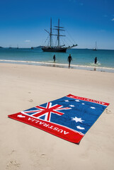 Australian flag towel on a beautiful tropical beach