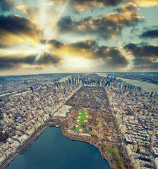 Panoramic aerial view of Central Park and Manhattan at sunset, New York City from a high vantage...