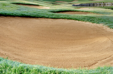 sandpit bunker golf course backgrounds, The sandpit on the golf course fairway is used as a hurdle...