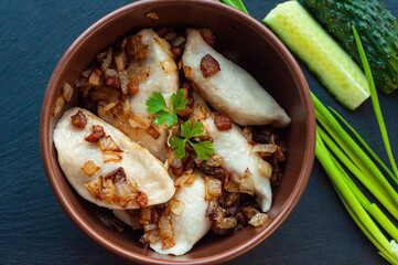 national Ukrainian dish, traditional varenyki with potatoes, cabbage, crackers made of lard and...