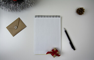 2023 notepad, envelope, gift and pen on office table. to-do list and plan for next year. flatlay composition. Goals for 2023