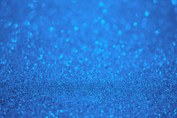 Light blue glitter background...Texture of light blue glitter particles.