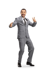 Cheerful professional man in suit dancing