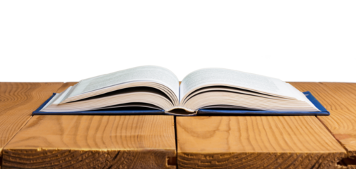 An open book lies on a wooden table