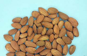 Californian almond nuts on white background. Unshelled almonds best healthy dried fruit photography