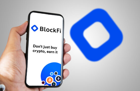hand holding a phone with BlockFi mobile app on screen