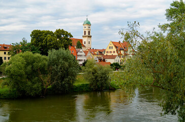 Fototapeta na wymiar a scenic view of the ancient Bavarian Regensburg city with its beautiful Saint Emmeram's Abbey and ancient houses on a spring day (Bavaria, Germany)