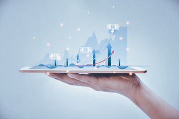 Development and growth concept on virtual interface from digital tablet.plan growth and increase of positive indicators in business.growth graph of business and analyzing financial and investment 