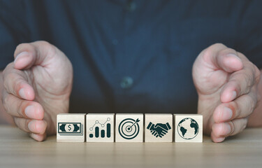 business strategy, Action plan, Goal and target, woods block step on table with icon about business strategy and Action plan. business development concept. wooden cube