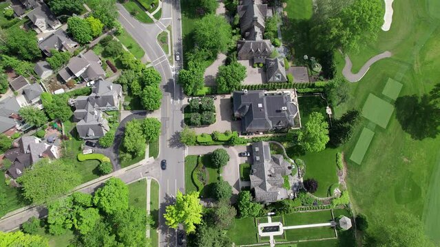 Establishing Landscape Aerial Of Expensive, Upper Class Neighborhood Estates, Large Homes, Mansions, And Green Lawns With Swimming Pools In High-income Suburb Sprawl In Midwest Columbus, Ohio, USA