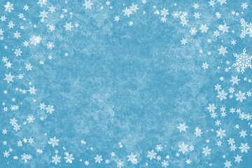 Winter abstract background - snowflakes on a blue background.
