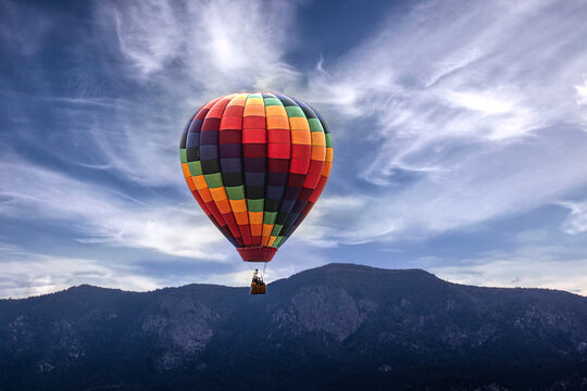 Hot Air Balloon Over Mountain