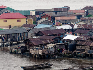Fototapeta na wymiar Panorama of african town on the riverside. Lagos, Nigeria, Africa