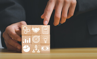 business strategy, Action plan, Goal and target, hand stack woods block step on table with icon about business strategy and Action plan. business development concept. copy space
