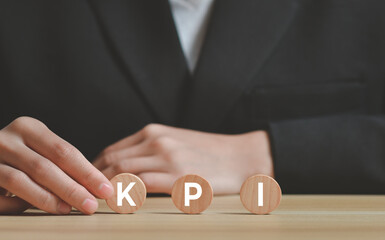  KPI (KEY, Performance and Indicator) with icon on  wooden cube, business and industrial analysis