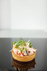 delicious italian food. sandwich with shrimps and salmon, ham and mozzarella cheese
