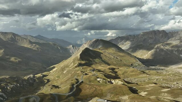 Epic cinematic mountain landscape aerial shot over french alps summits summer 