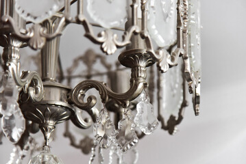 Silver chrystal chandelier close-up view