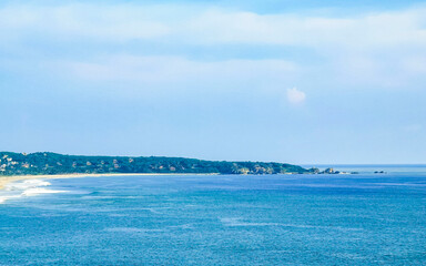 Fototapeta premium Beautiful natural panorama seascape palm trees beach Puerto Escondido Mexico.